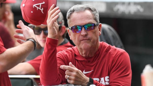 Razorbacks coach Dave Van Horn in dugout at practice scrimmage
